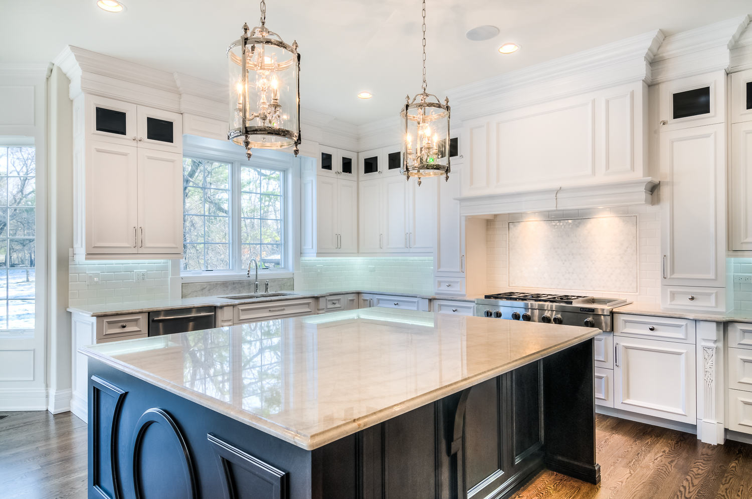 A modern kitchen featuring granite countertops from NEKA
