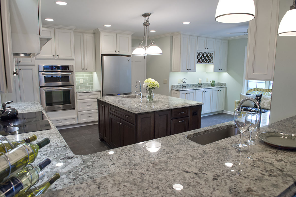 A modern kitchen featuring granite countertops from NEKA